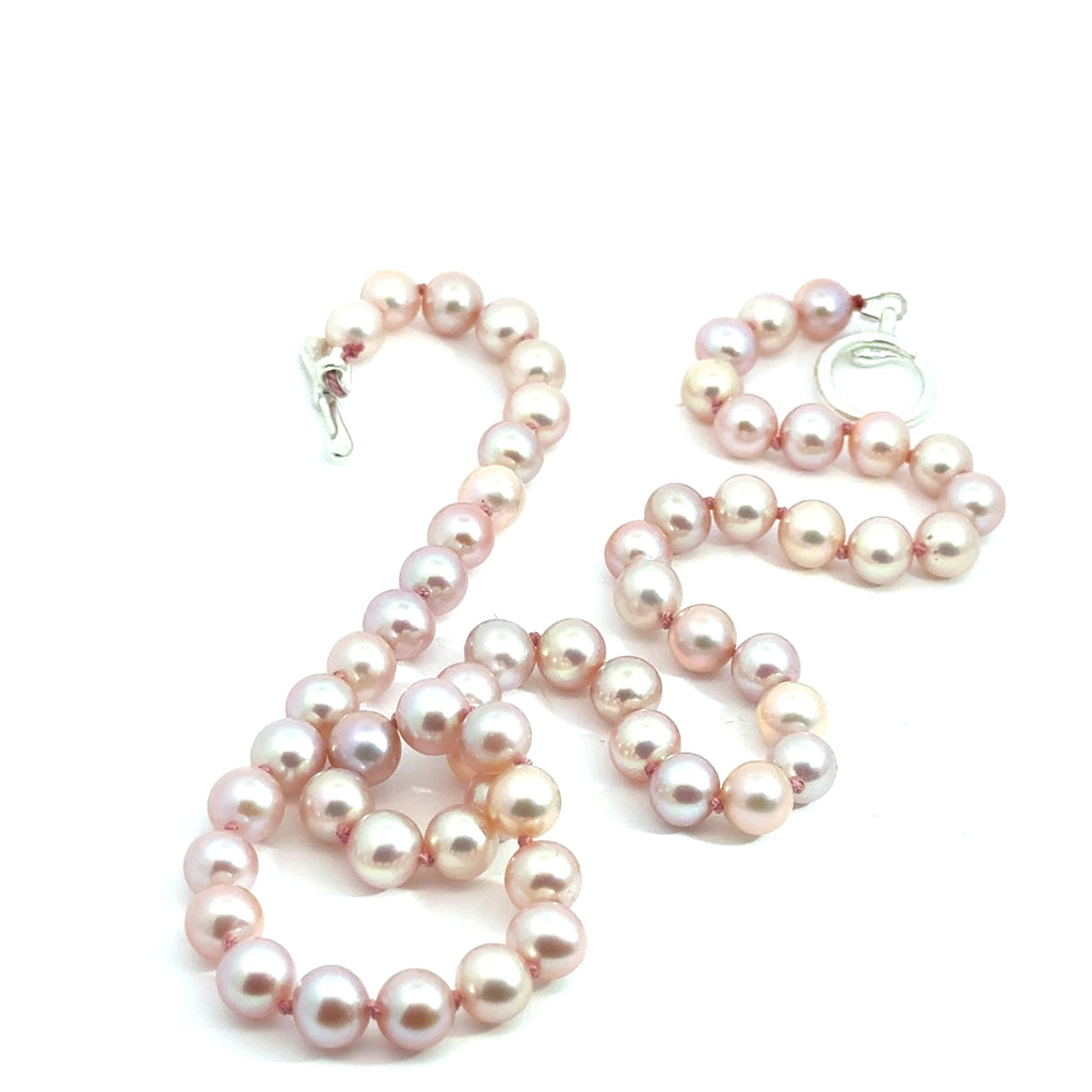 Light Pink Freshwater Pearl Necklace on white lower close up overview