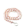 Light Pink Freshwater Pearl Necklace on white spiral center overview