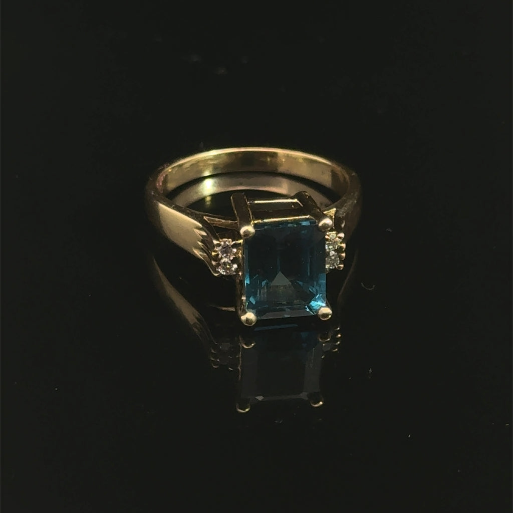 London Blue Topaz & Diamond 14k Gold Ring on black back