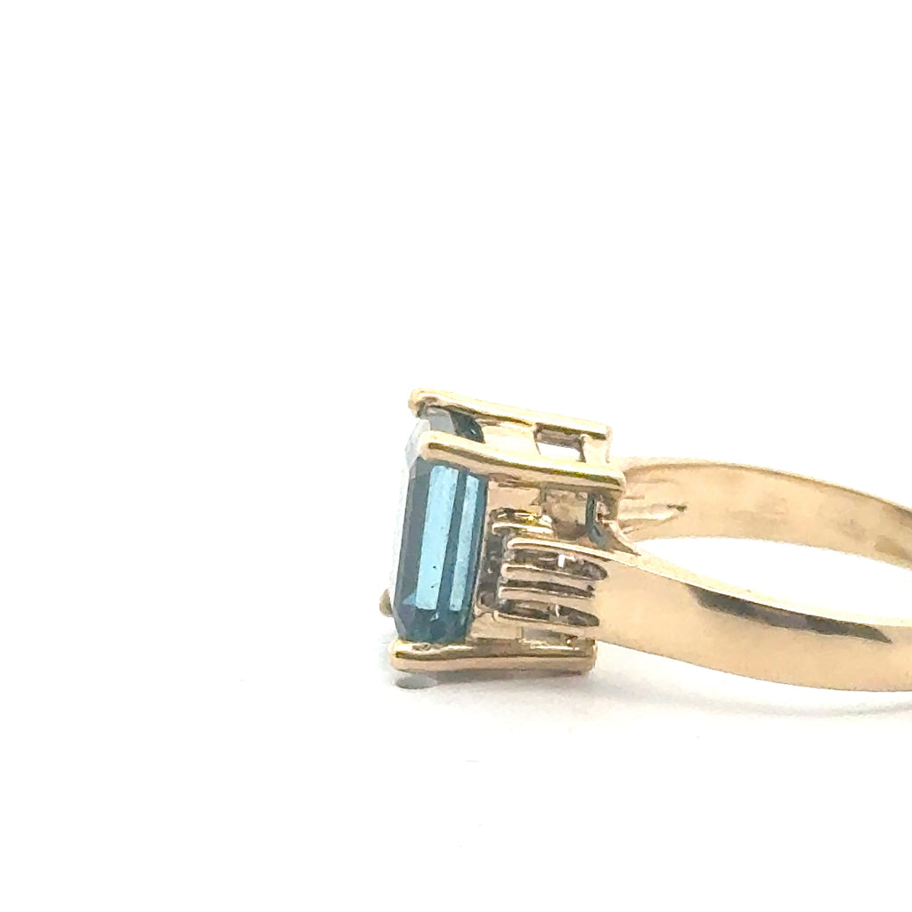 London Blue Topaz & Diamond 14k Gold Ring on white left side, close up
