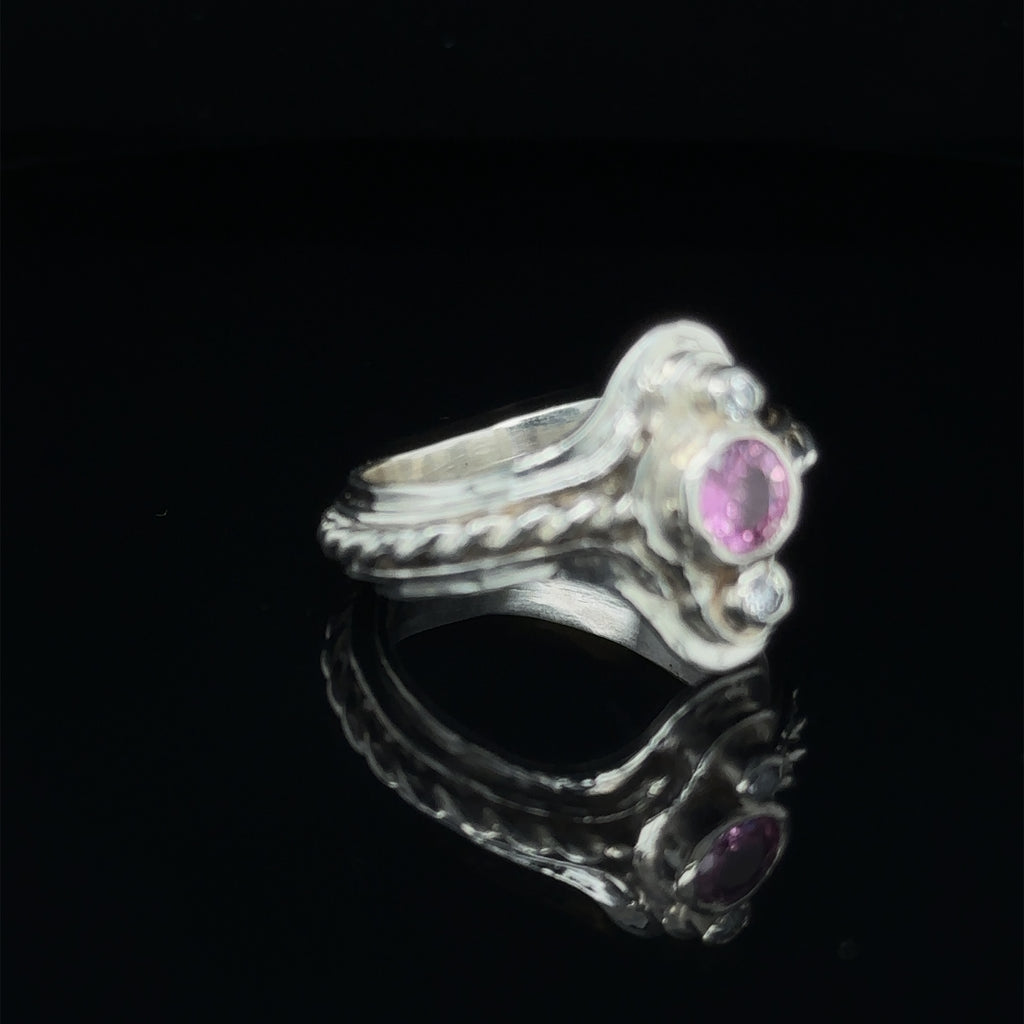 Luxury gemstone ring for women, perfect for gifting or personal wear on black right angle view