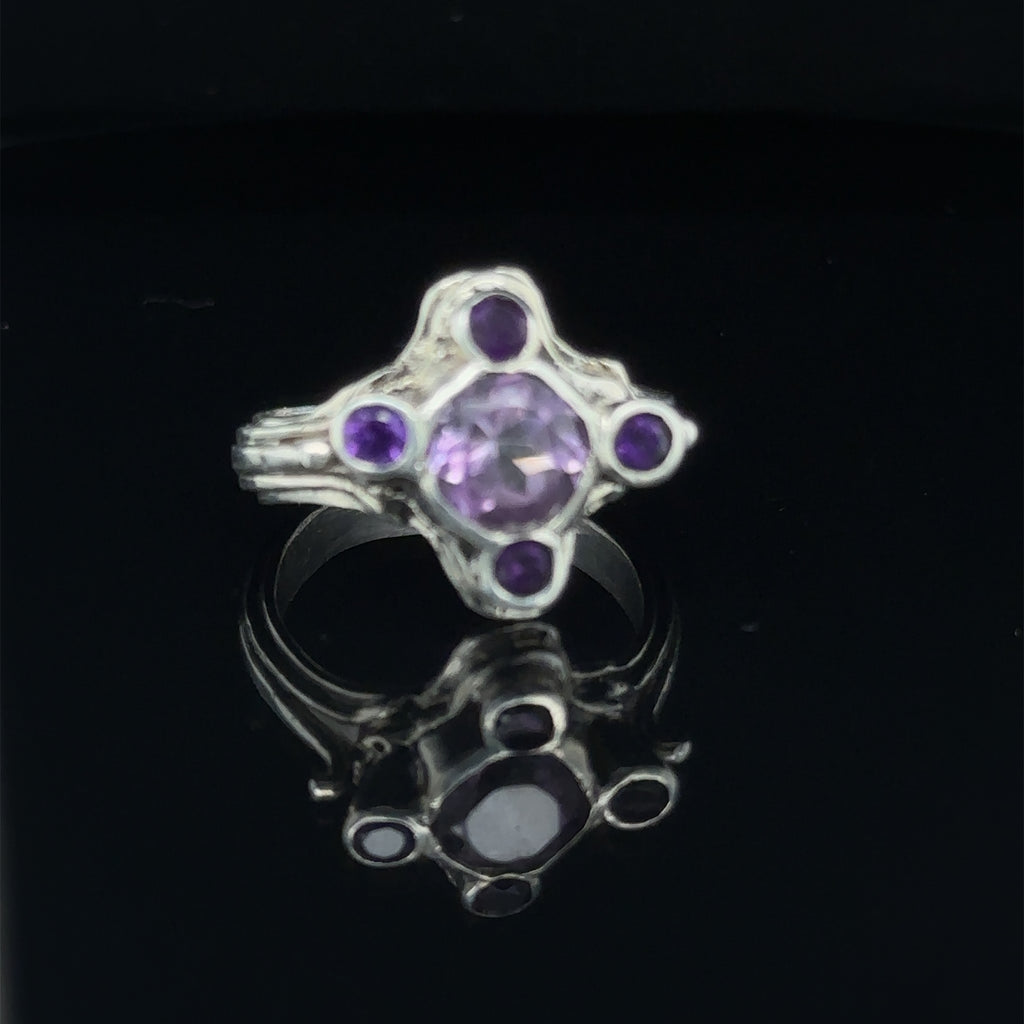 Luxury gemstone ring perfect for gifting or personal wear, size 7 on black center view