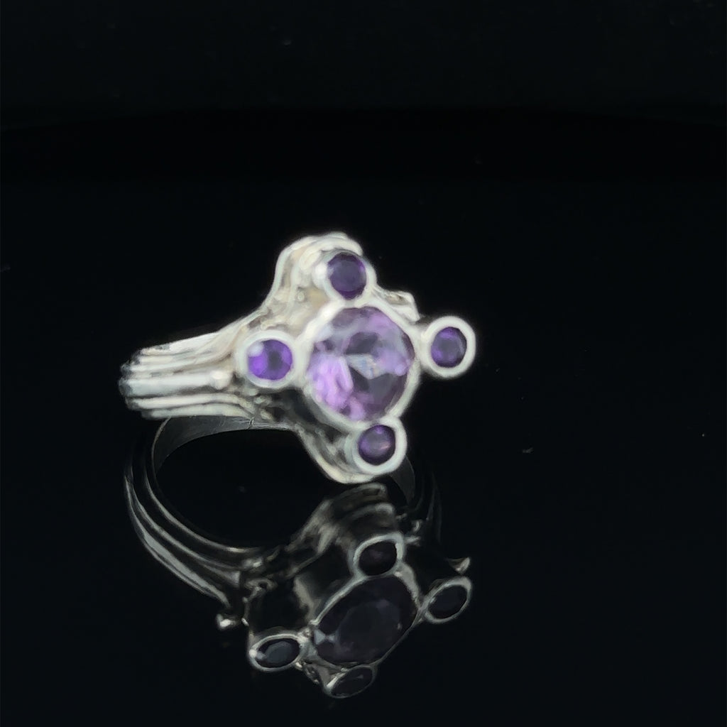 Luxury gemstone ring perfect for gifting or personal wear, size 7 on black slight right angle view