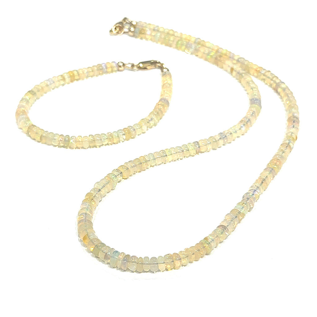 Matching Ethiopian Opal necklace available separately for a complete jewelry set on white front center view