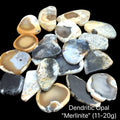 Merlinite Opal Gemstone slices on a black background, (11-20g), front view.