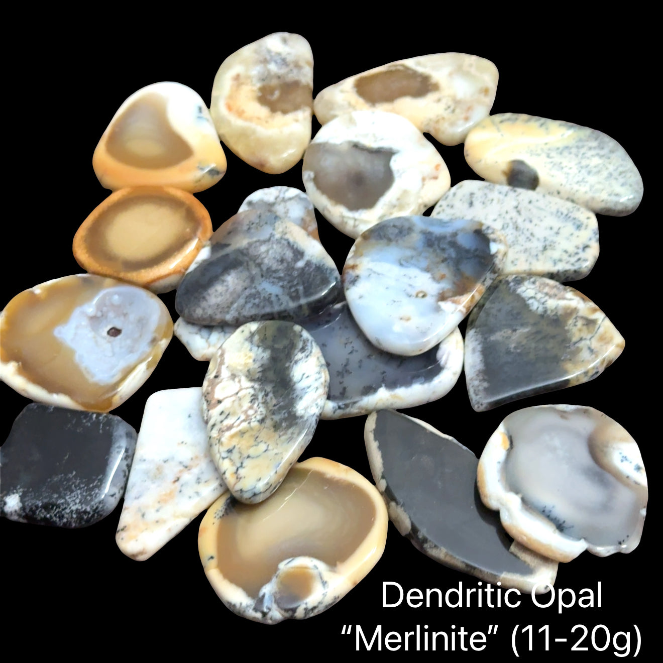Merlinite Opal Gemstone slices on a black background, (11-20g), front view.