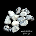 Merlinite Opal tumble Gemstone on a black background, (6-10g), front view.