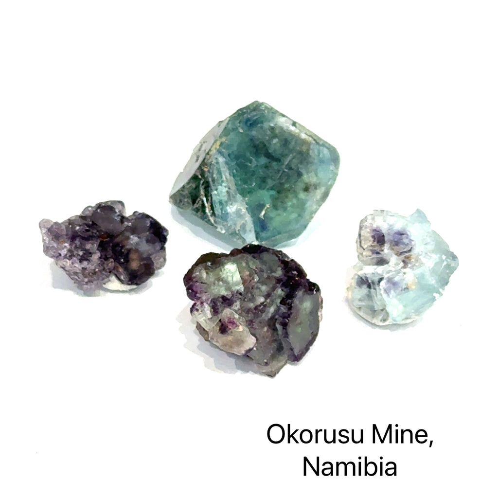 Minerals from Okorusu Mine, Namibia, on a white background, front view.