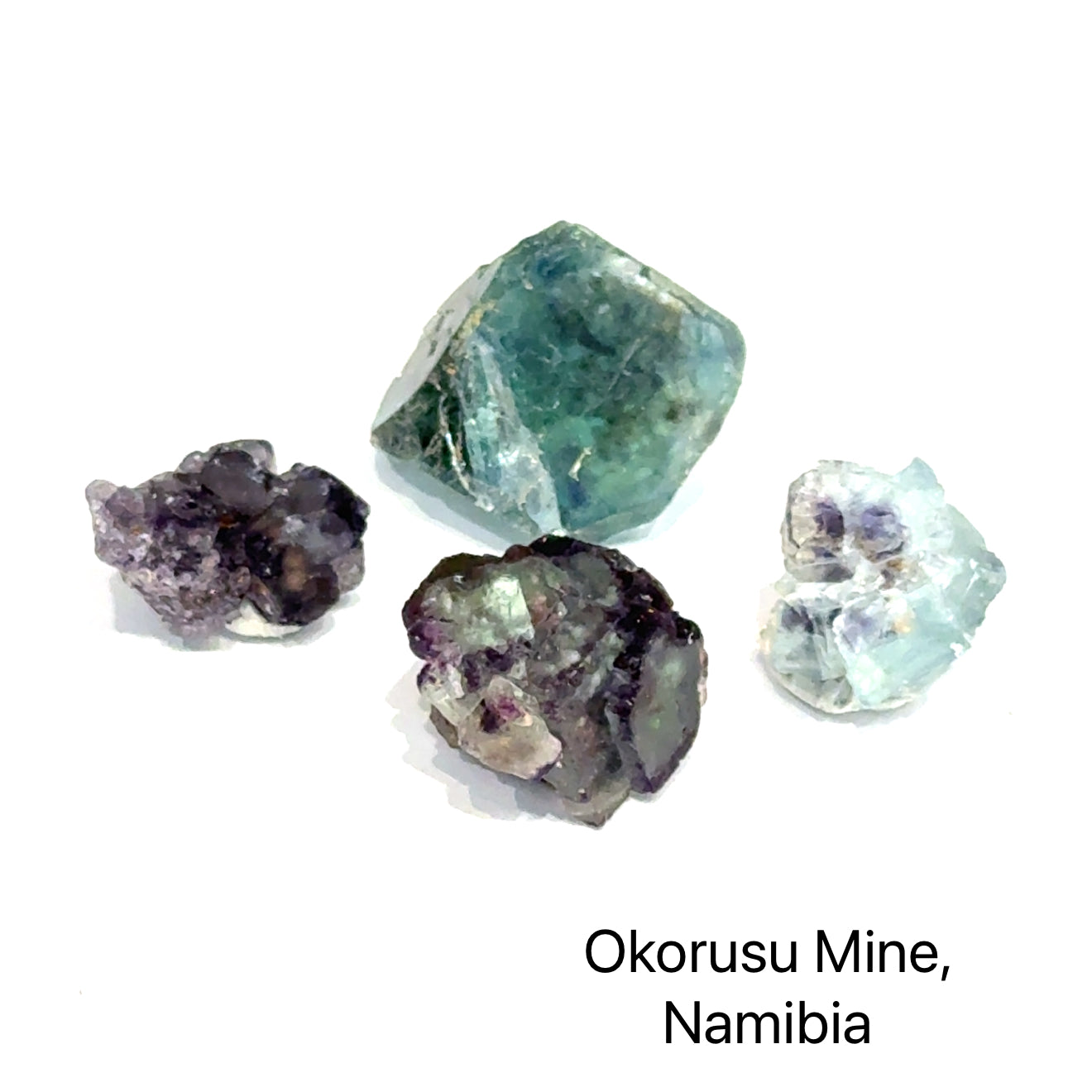 Minerals from Okorusu Mine, Namibia, on a white background, front view.