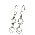 Multi-circle sterling silver dangle earrings with oval link showing sparkle and movement on a white background, front hanging overview.