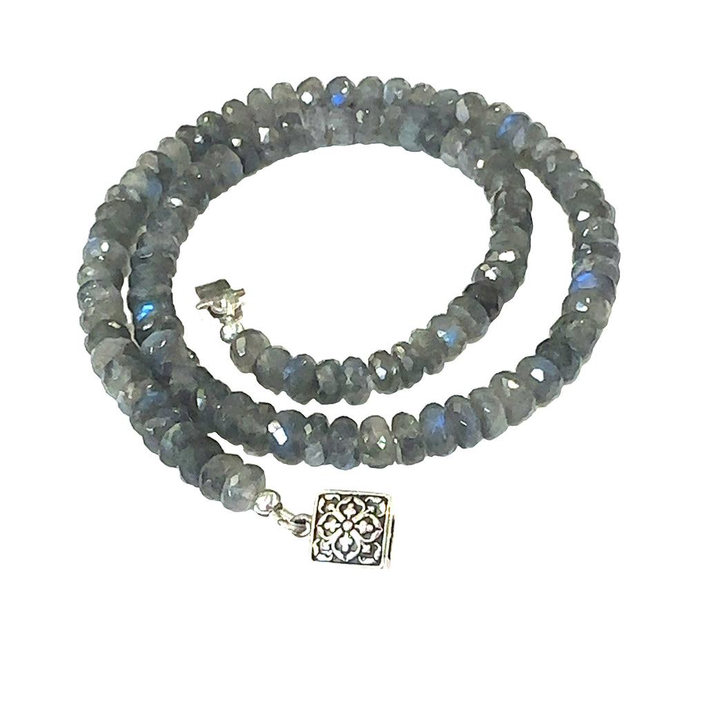 Mystical Labradorite crystal necklace for protection, ritual work, and self‑transformation spiral overview on white overview