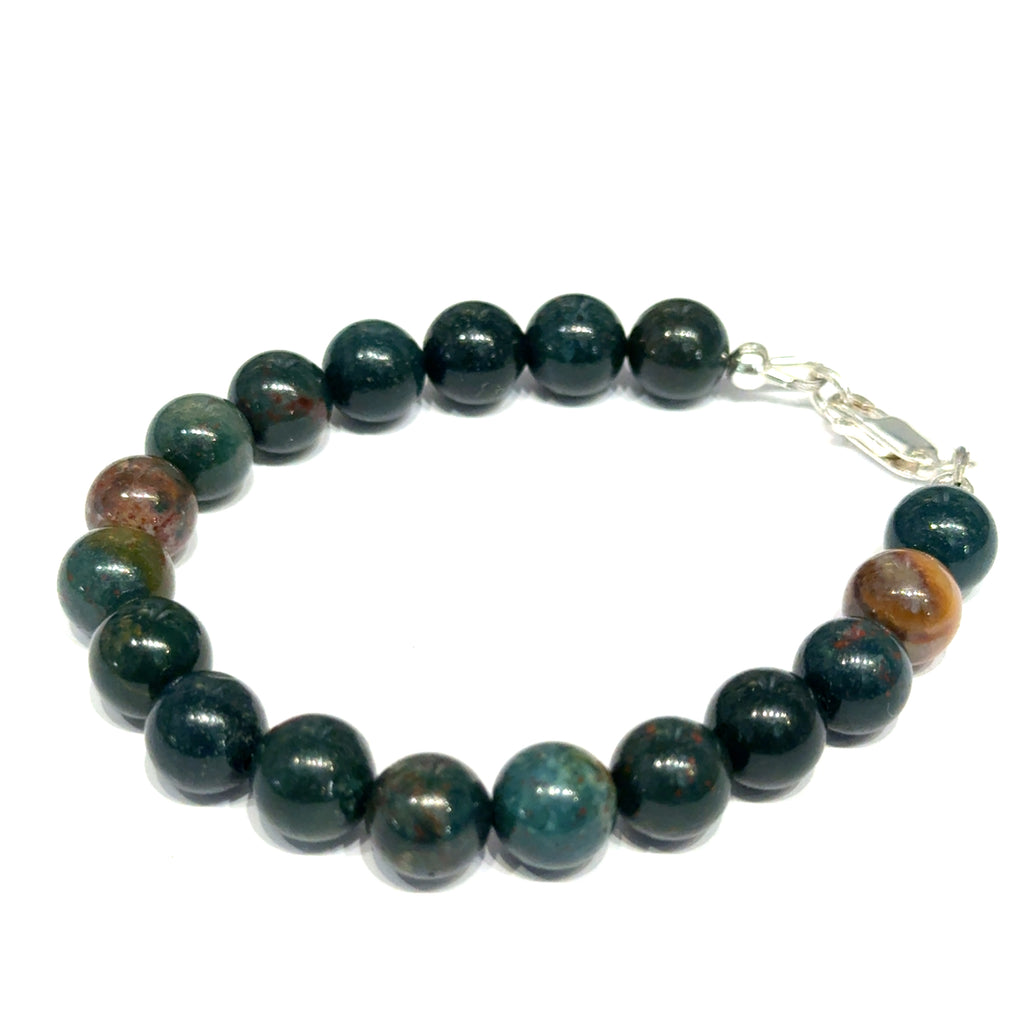 Natural bloodstone bracelet 8.5mm size 7.25'' beads with sterling silver clasp for root chakra healing and warrior strength on a white background, left angle overview. 