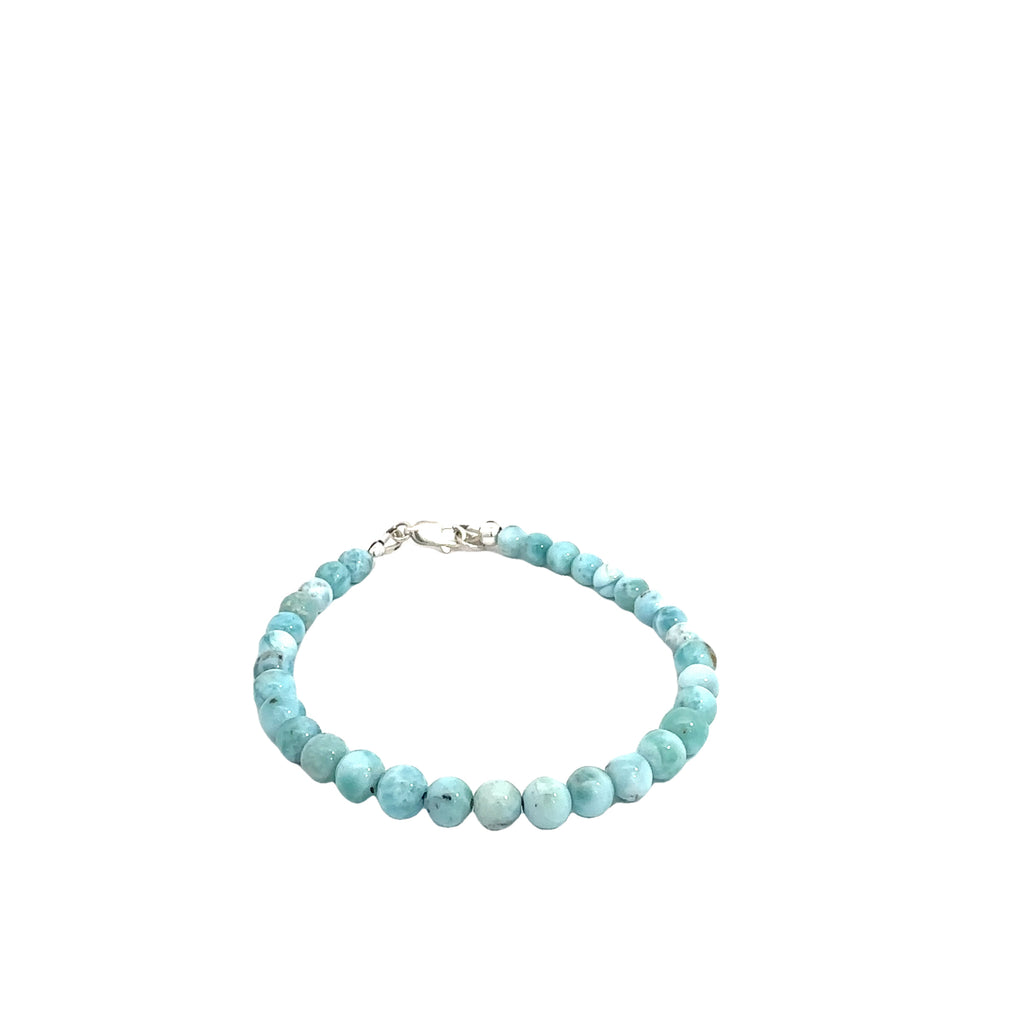 Ocean-blue Larimar beads strung on durable Beadalon wire with a sterling silver toggle on a white background front  center view. 