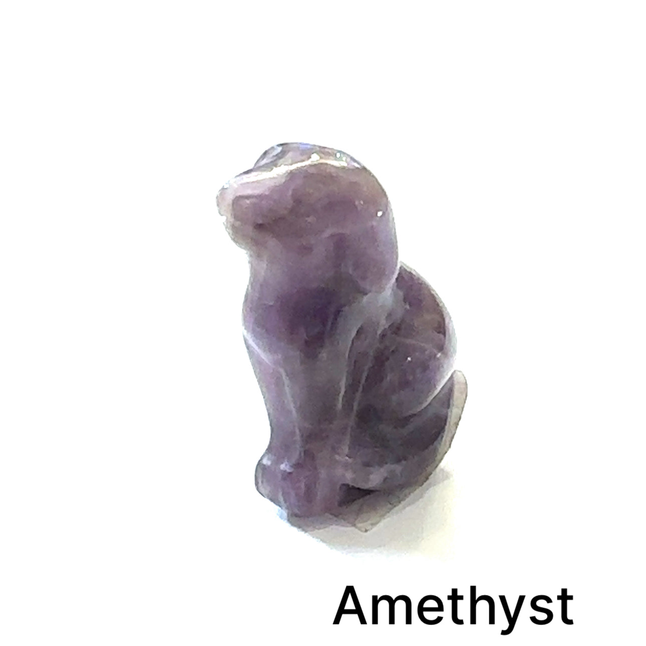 One Amethyst hound Dog gemstone carving on white background, front view.