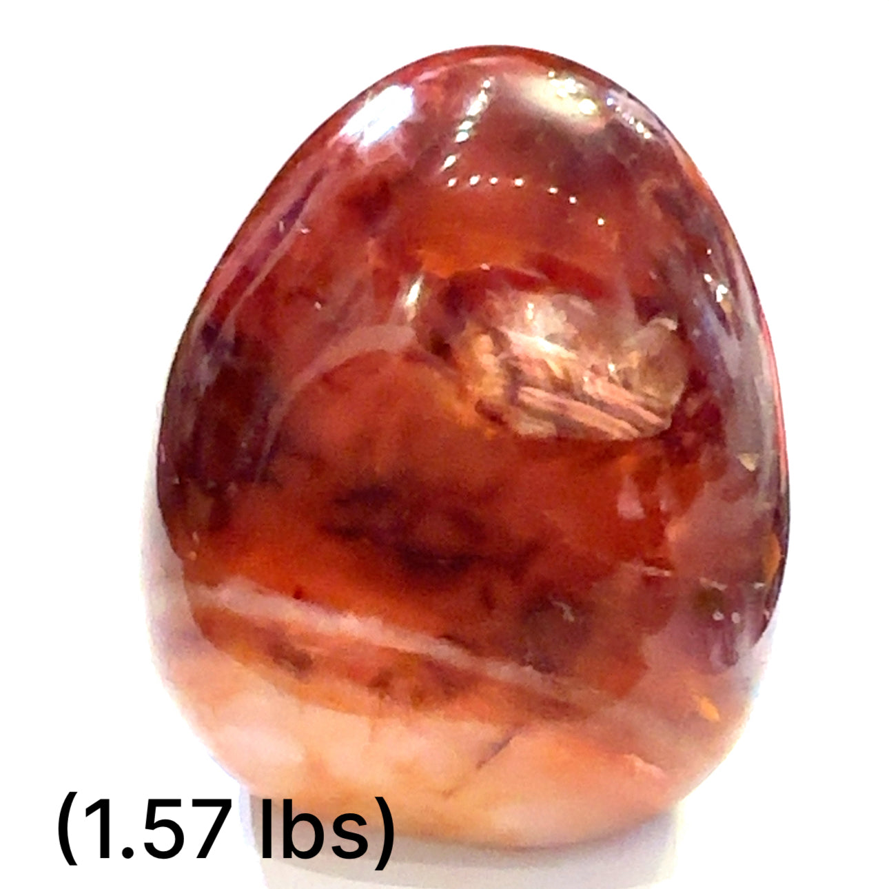 One Carnelian gemstones free-form shape (1.57 lbs) displayed on a white background, front view. 