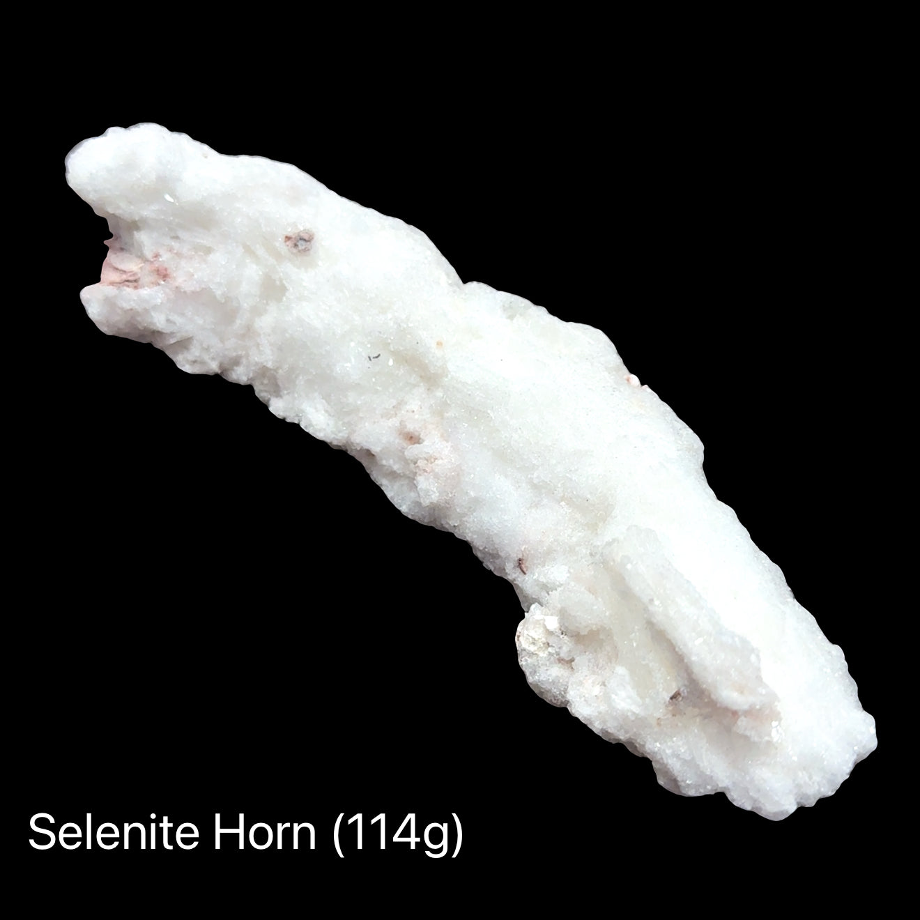 One Curved selenite crystal wand for energy clearing and meditation on a black background, (114g)  front overview. 