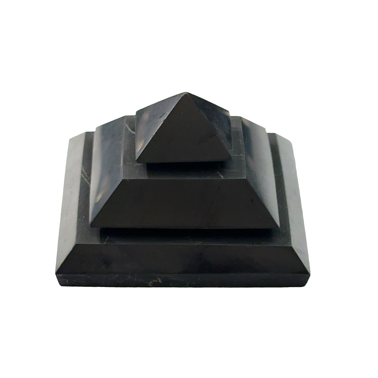 One Extra Large Black Shungite pyramid for EMF protection and electromagnetic shielding on a white background, front view.