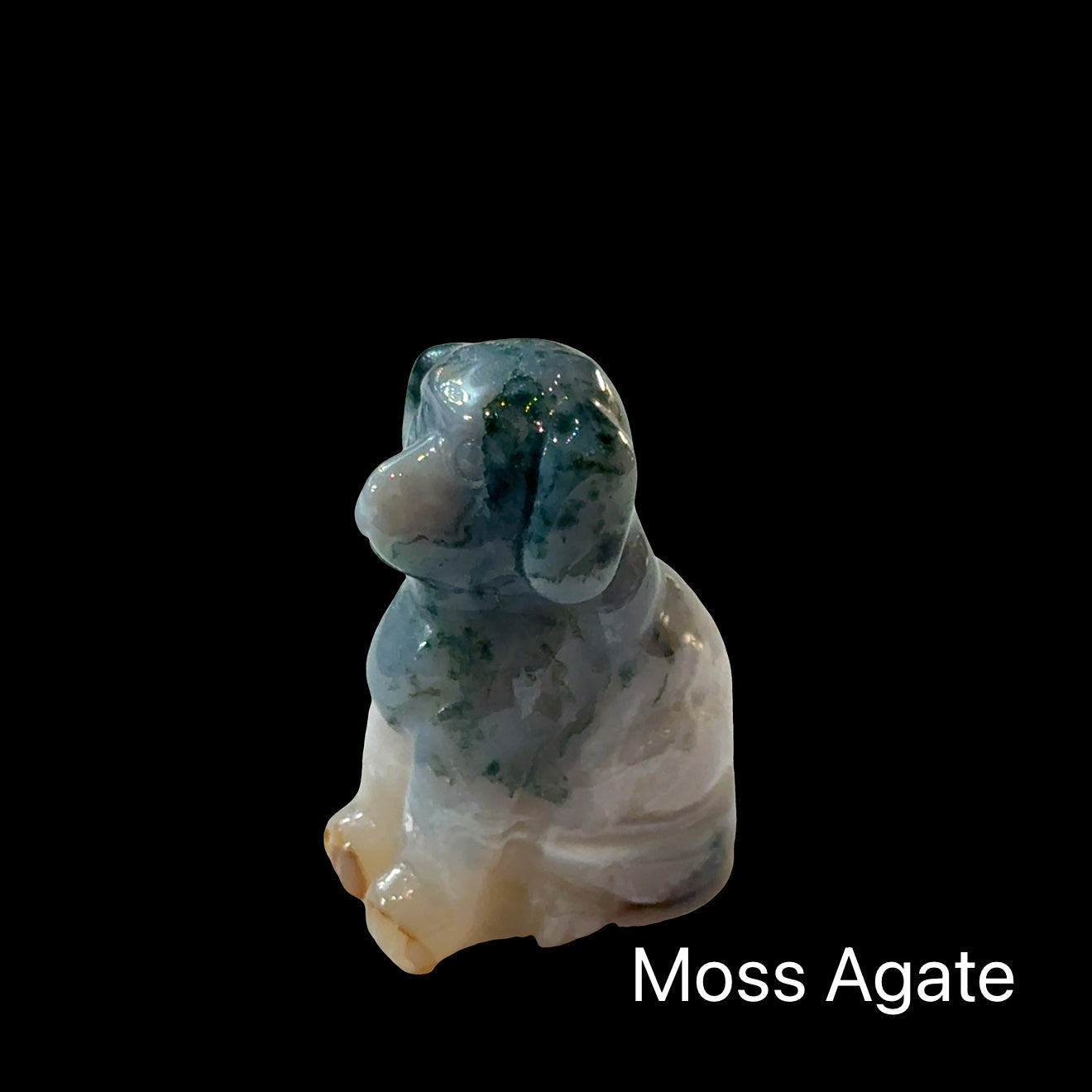 One Moss Agate hound Dog gemstone carving on white background, front view.