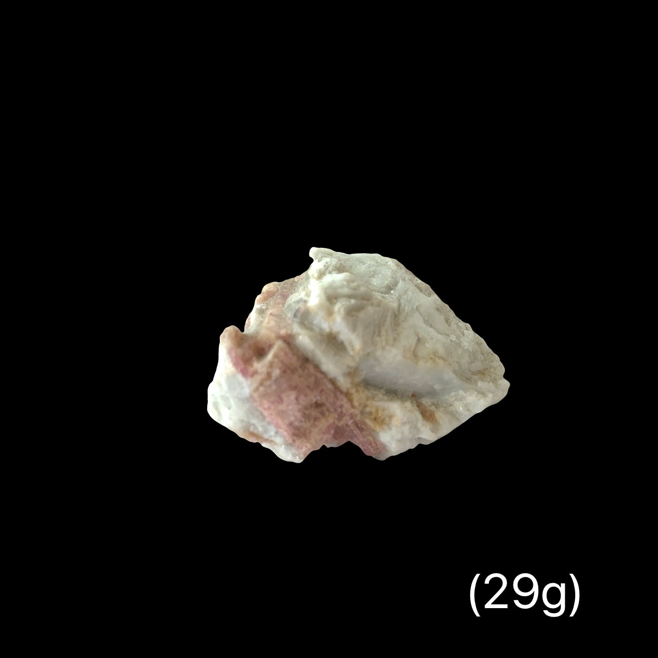 One piece of Rubellite Tourmaline in a Feldspar on a black background with weight indication (29g), front view.