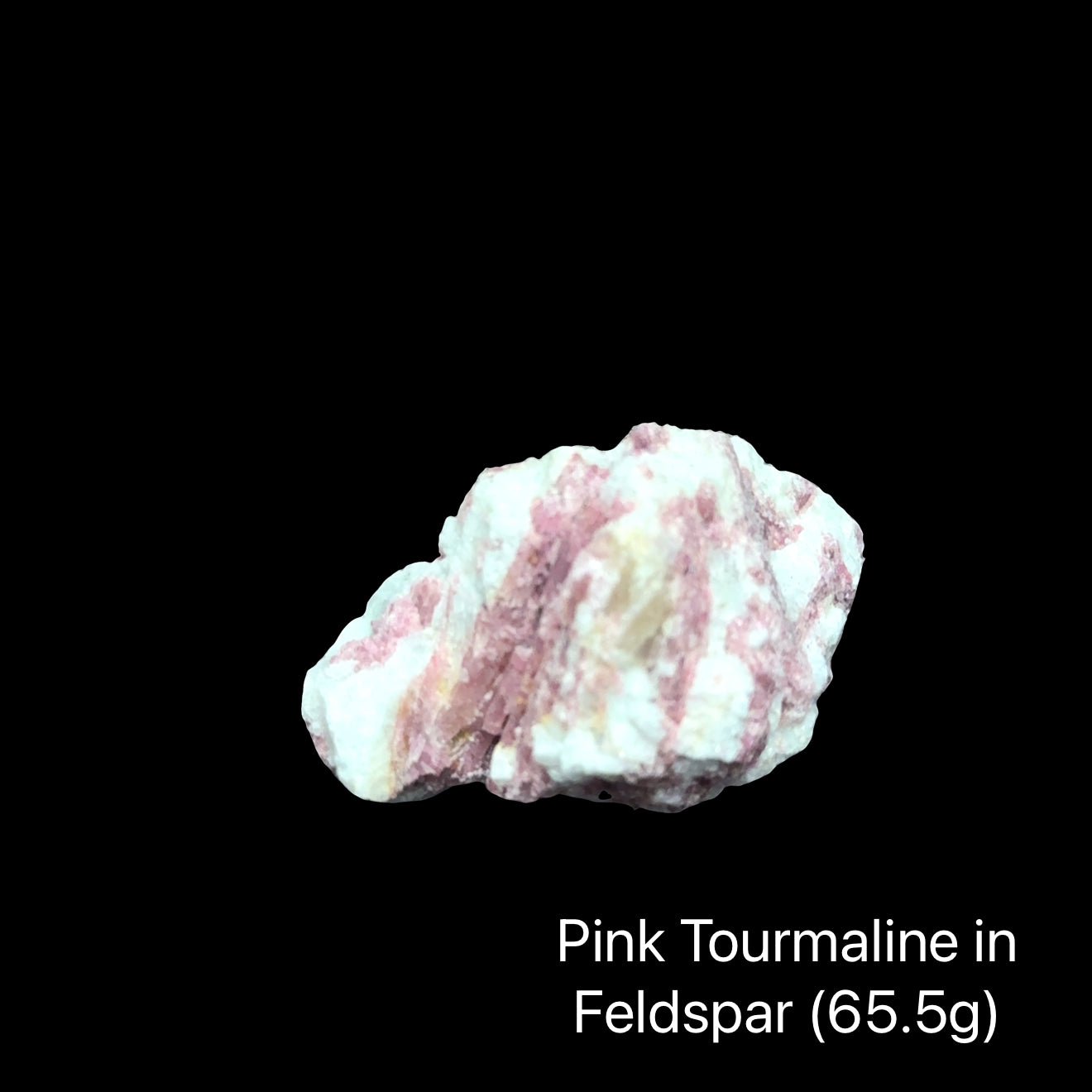One piece of Rubellite Tourmaline in a Feldspar on a black background with weight indication (65.5g), front view.
