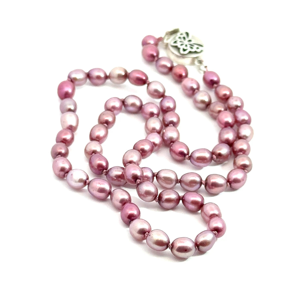 Pink Freshwater Pearl Necklace on white center close up overview