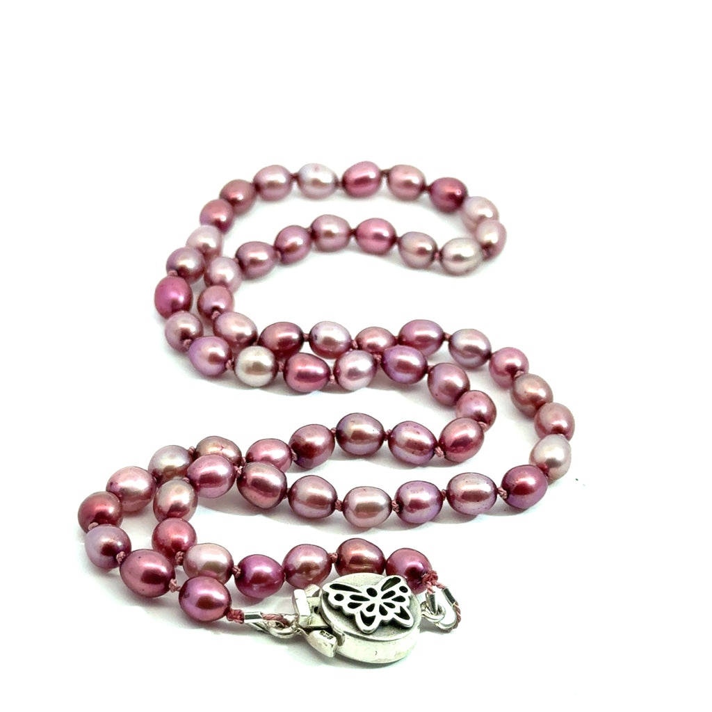 Pink Freshwater Pearl Necklace on white center close up pendant overview