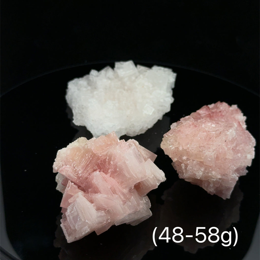 Pink Halite Raw Gemstone on black 48-58g front view