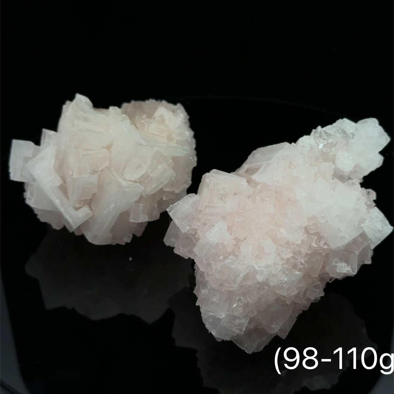Pink Halite Raw Gemstone on black 98-110g front view