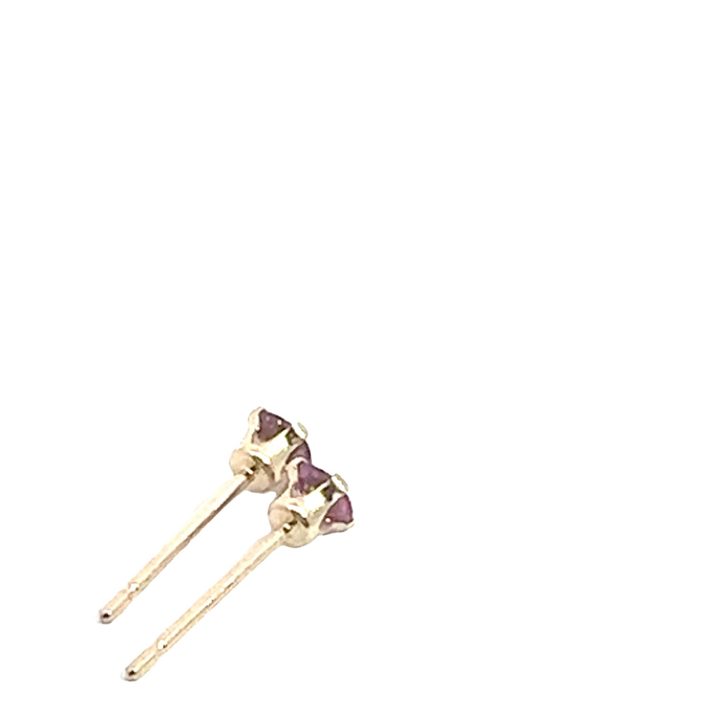 Pink Sapphire Stud Earrings  angled on white bottom to top overview