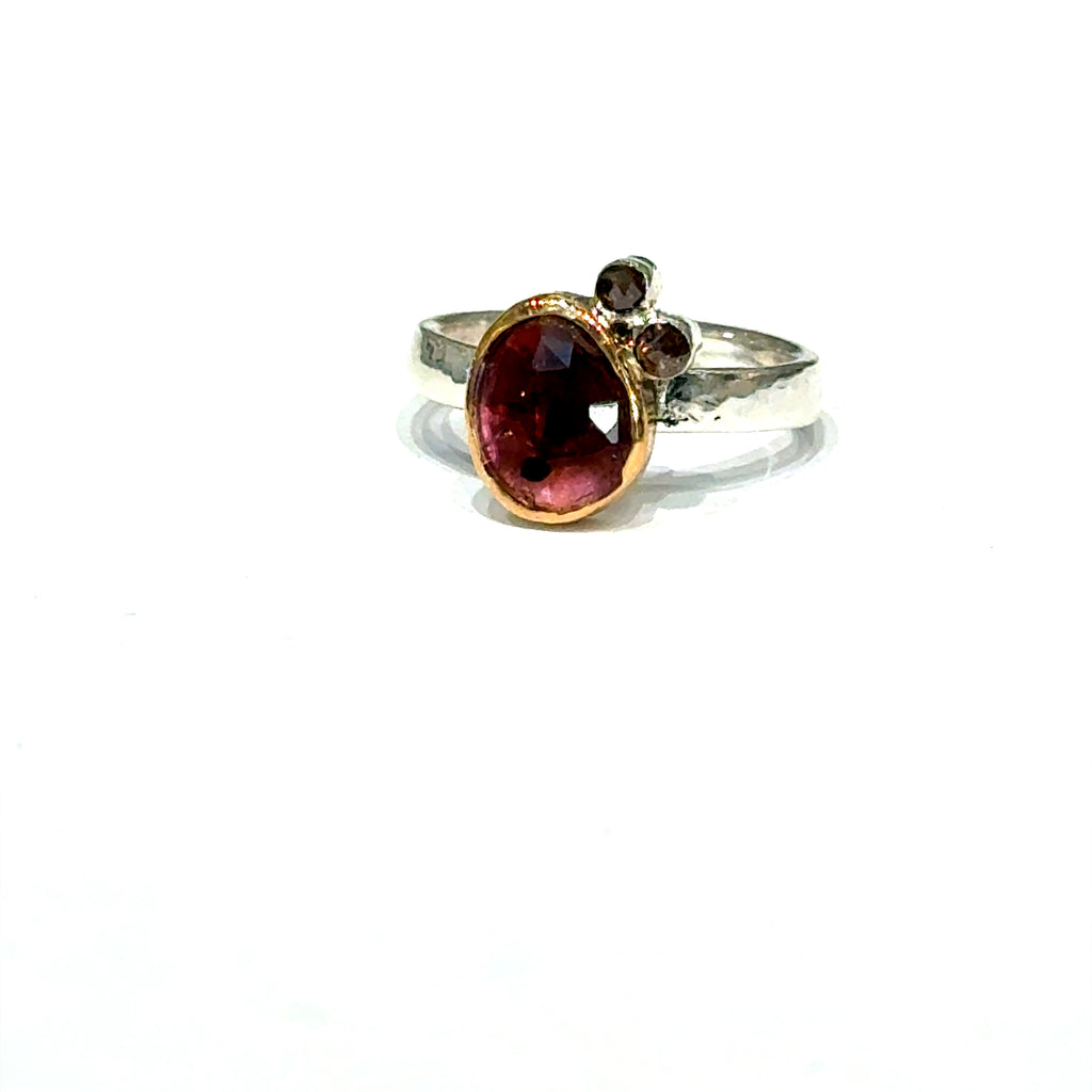 Pink sapphire and chocolate diamond mixed metal ring — handmade in Boston on a white background front overview.