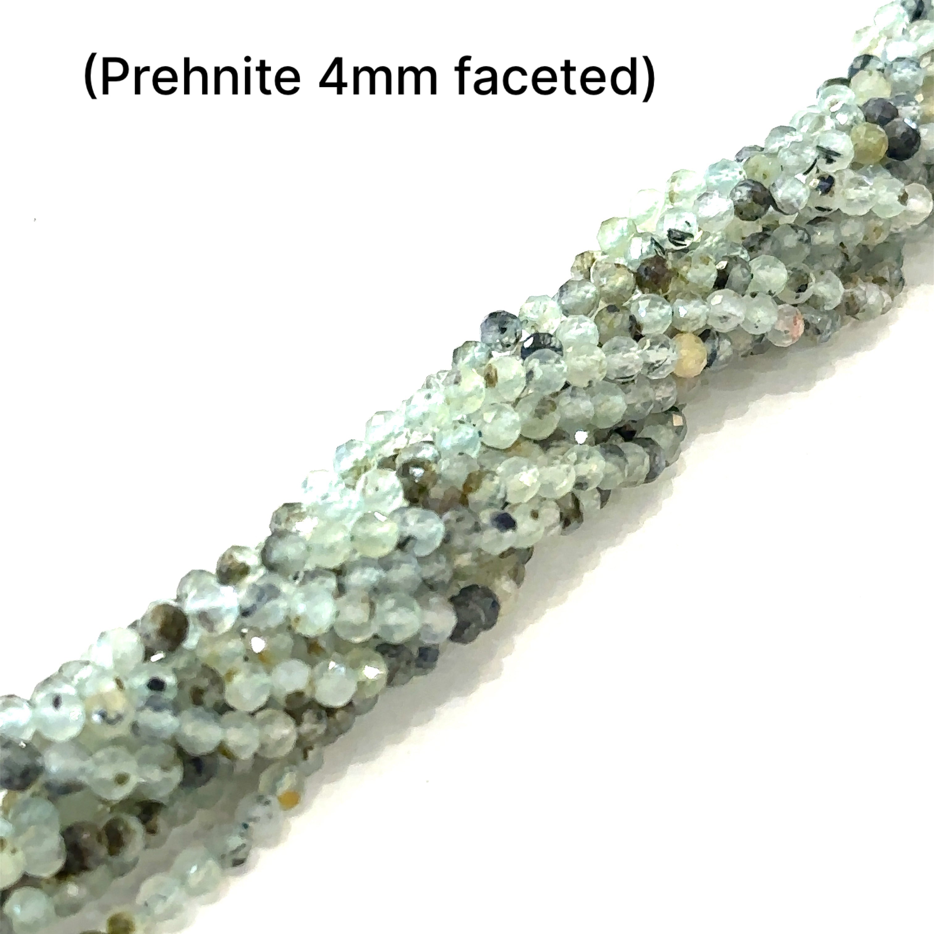 Prehnite 4mm faceted round gemstone on a white background, front overview. 