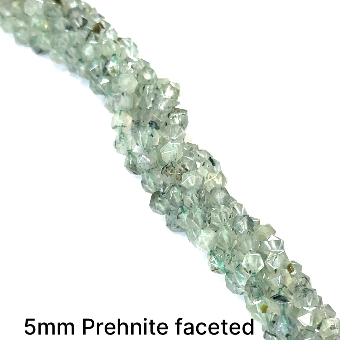 Prehnite 5mm faceted round gemstone on a white background, front overview. 