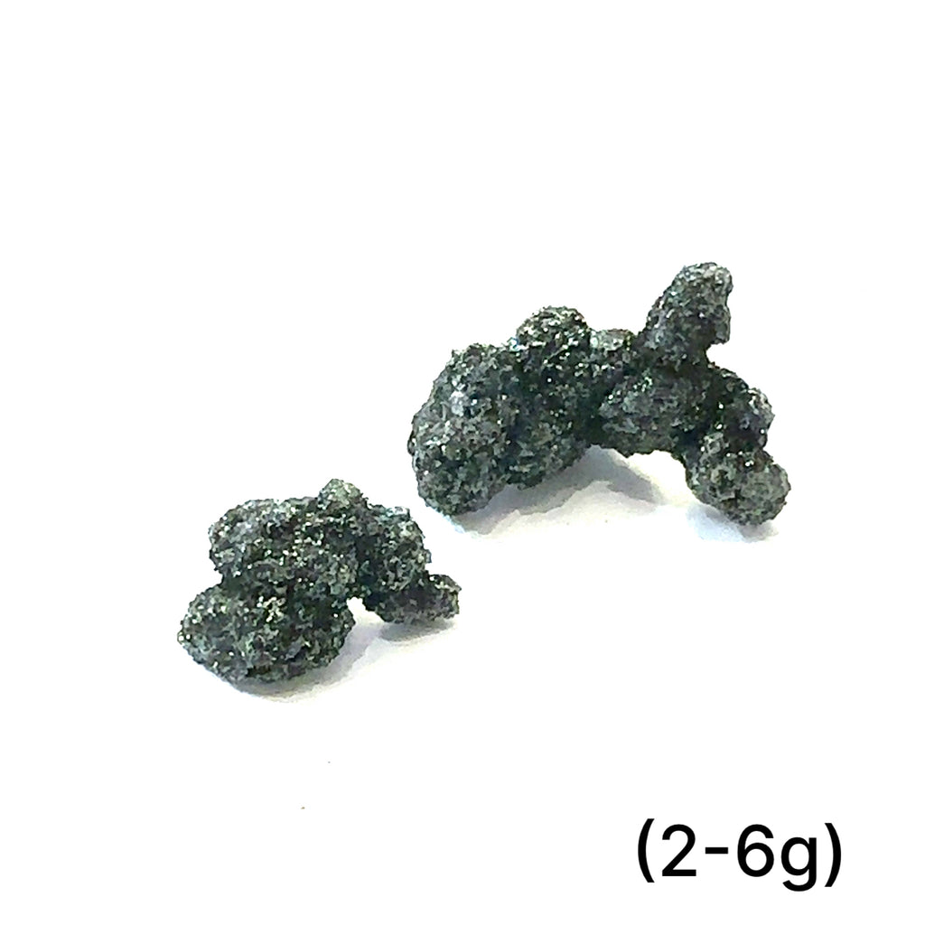 Primalite Raw Gemstone grouping (2-6g) on white overview