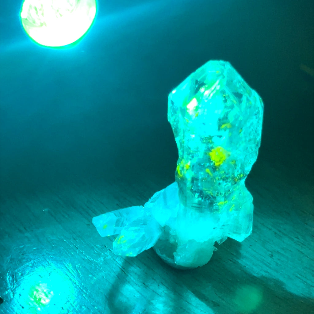 Quartz Raw Gemstone Collector’s Piece #5 on white back overview with blue light