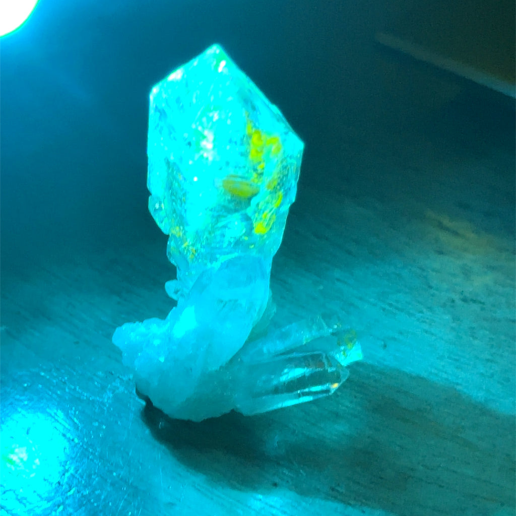 Quartz Raw Gemstone Collector’s Piece #5 on white front overview with blue light