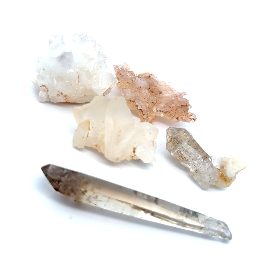 Quartz Raw Gemstone Collector’s Piece grouping on white front overview