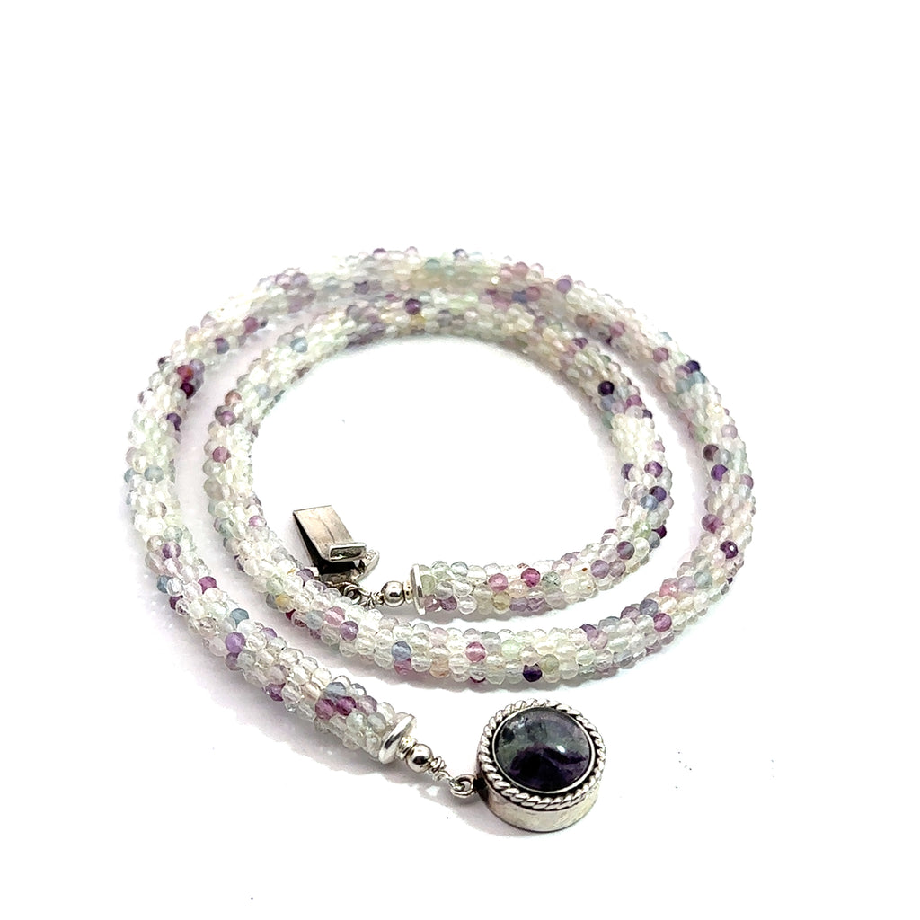 Rainbow Fluorite Gemstone Necklace on white spiral bottom overview