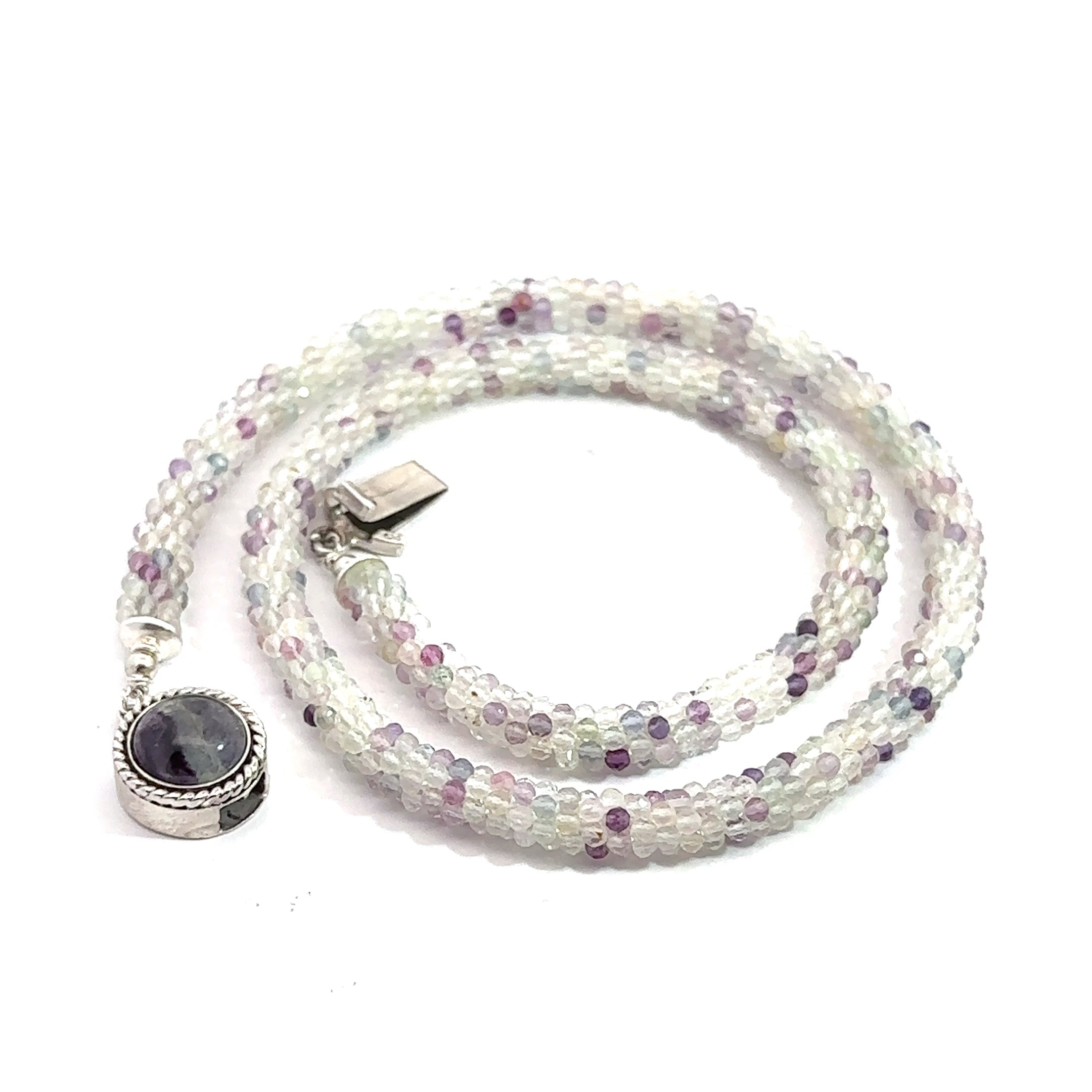 Rainbow Fluorite Gemstone Necklace on white spiral side overview