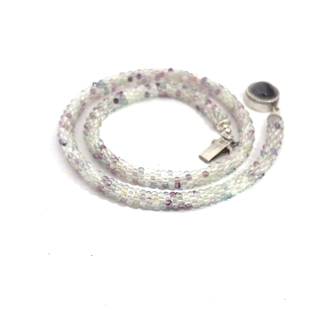 Rainbow Fluorite Gemstone Necklace on white spiral top angle overview