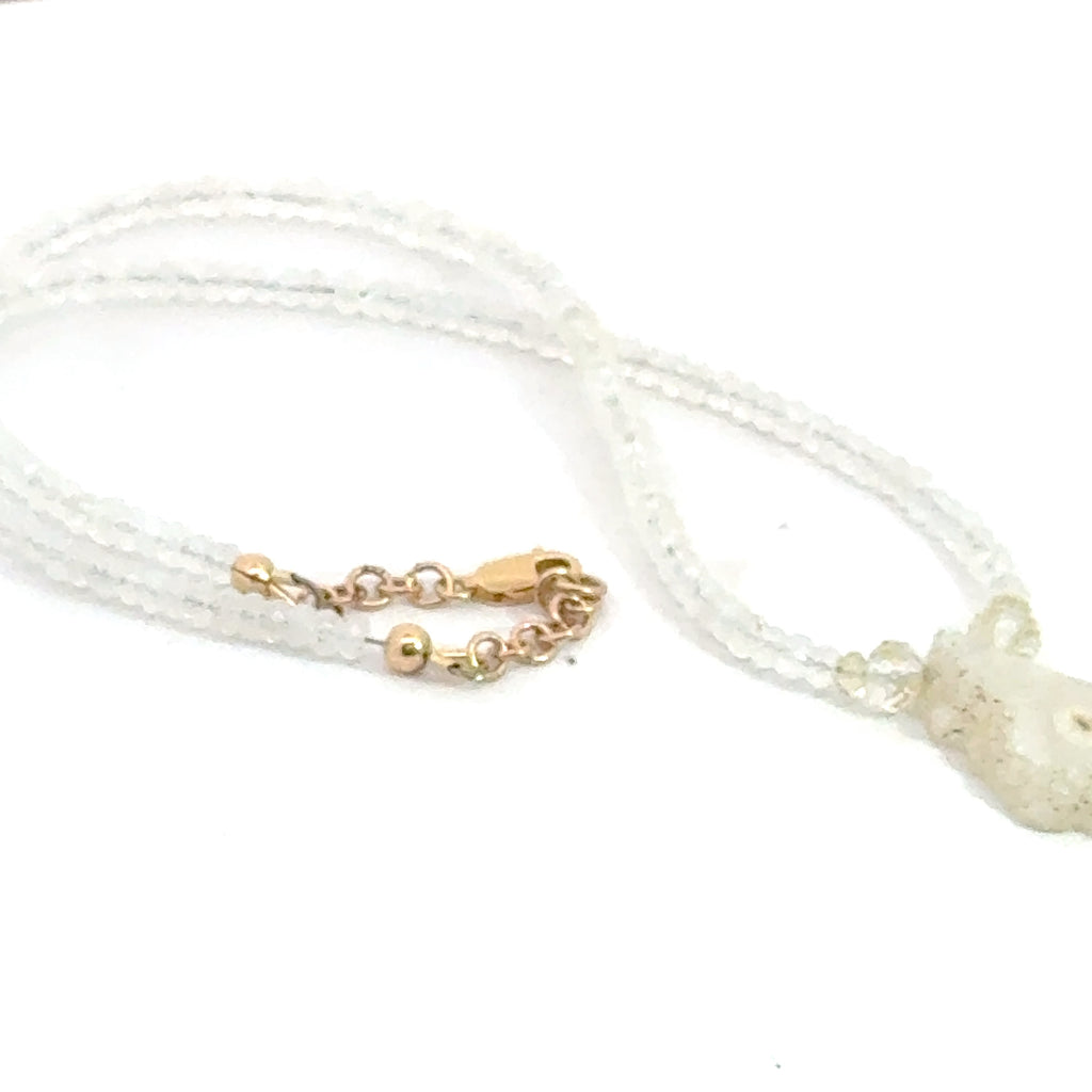 Rainbow Moonstone Necklace – Faceted Gemstone with Solar Quartz on white left angle view