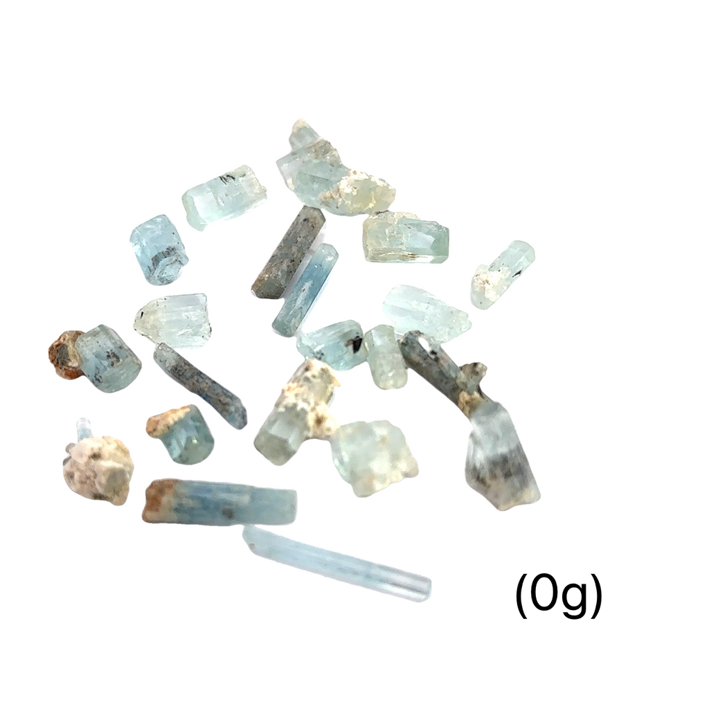 Raw Aquamarine with Schorl Gemstone 0g on white overview 