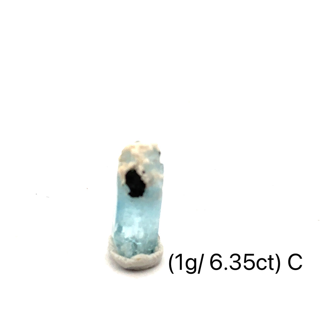 Raw Aquamarine with Schorl Gemstone 1g C  on white close up overview