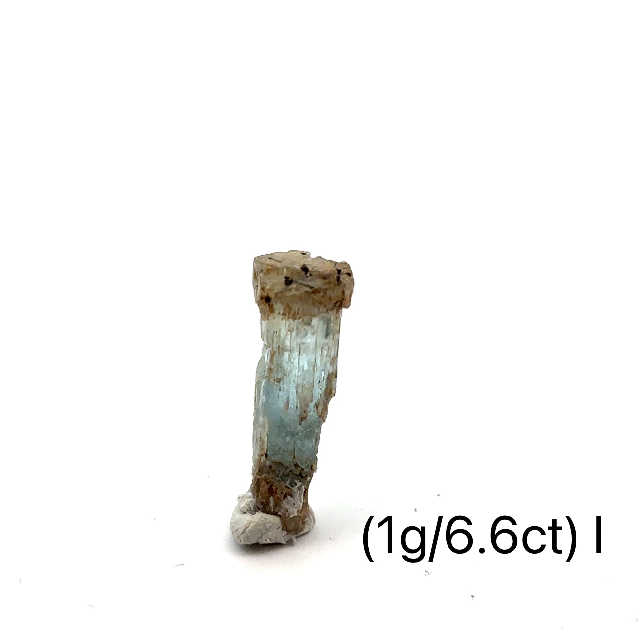 Raw Aquamarine with Schorl Gemstone 1g I on white close-up overview