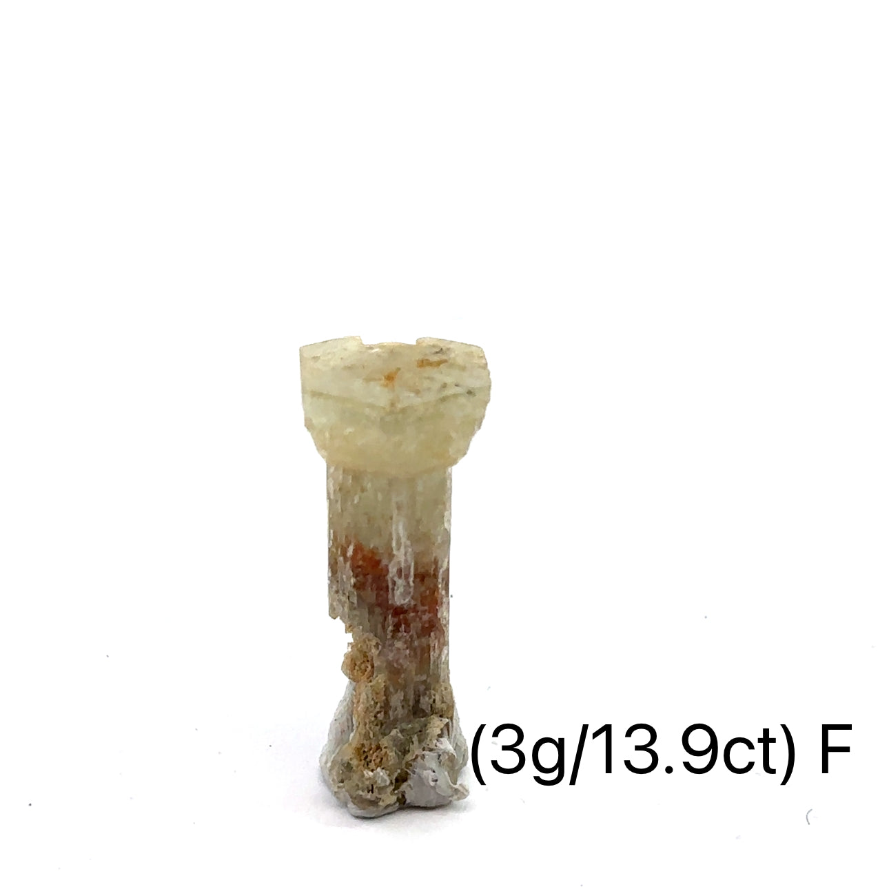 Raw Aquamarine with Schorl Gemstone 3g F on white close-up 