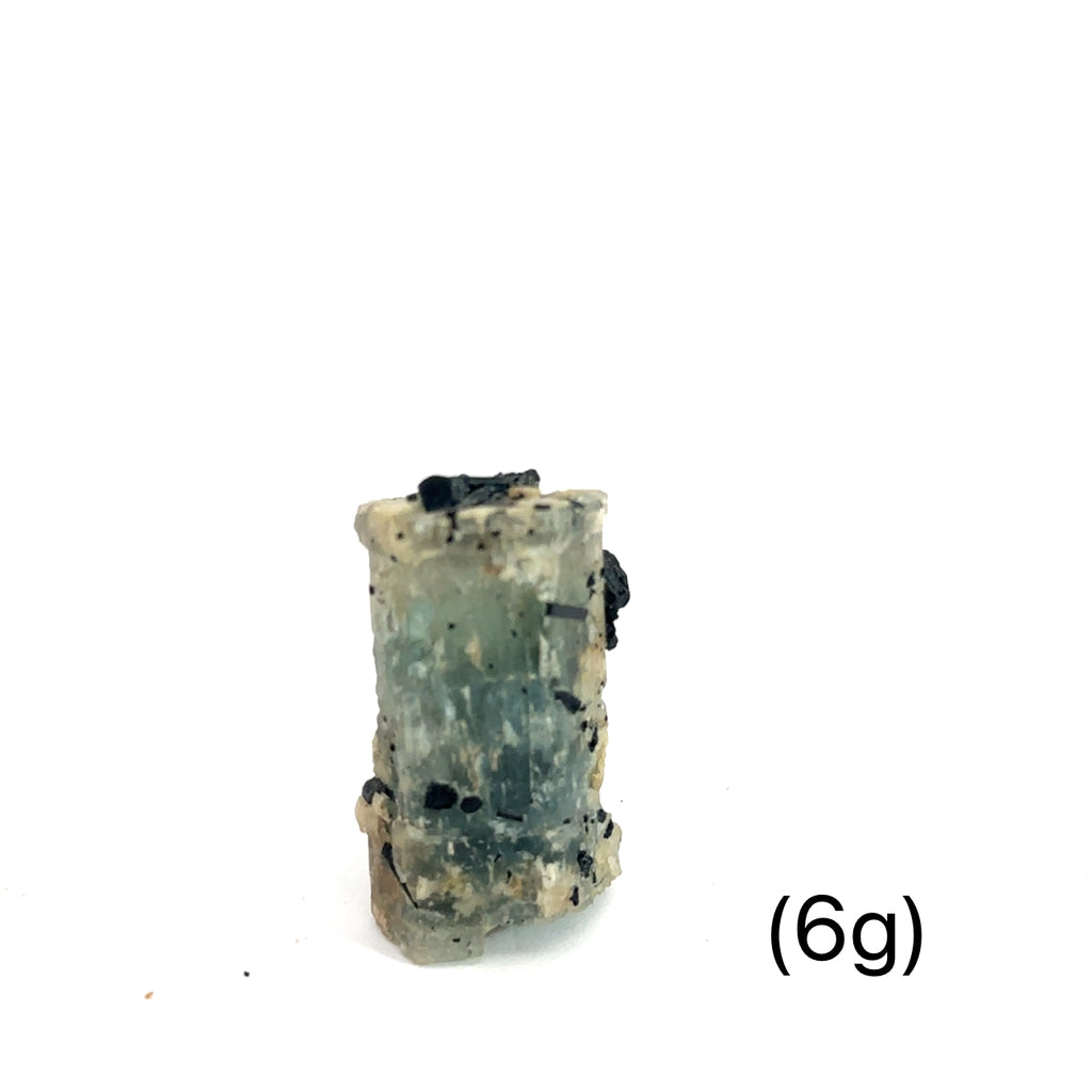 Raw Aquamarine with Schorl Gemstone 6g on white overview 