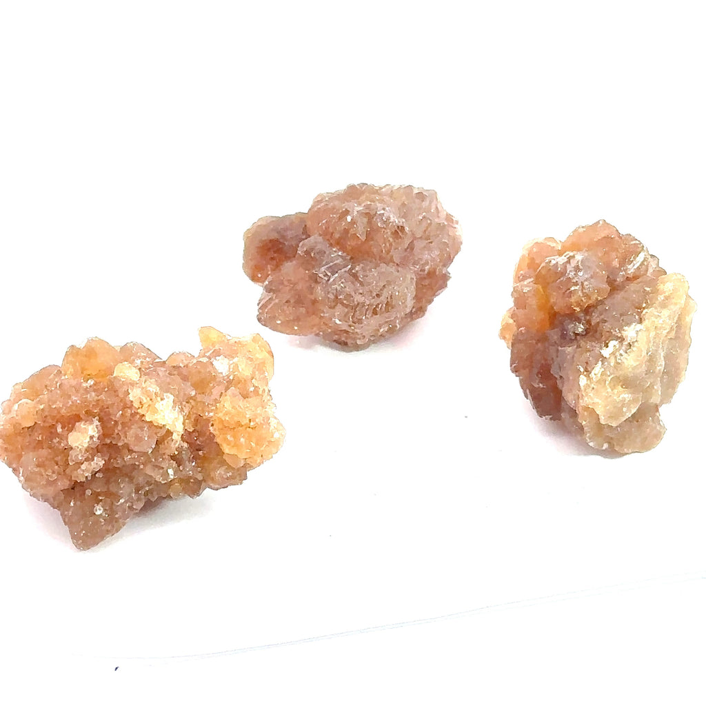 Raw Citrine Spray Gemstone from Morocco grouping on white overview