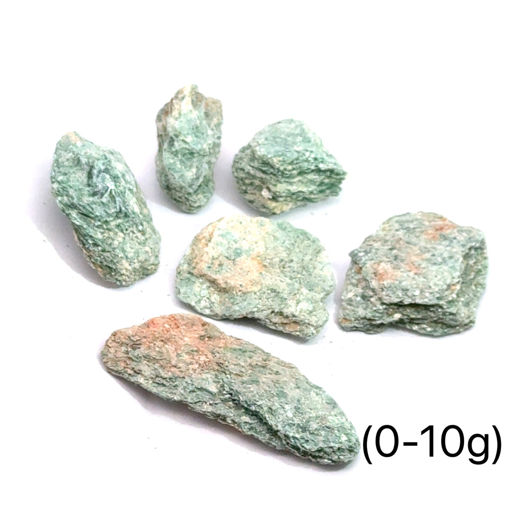 Raw Fuchsite Gemstone grouping on white 0-10g overview 
