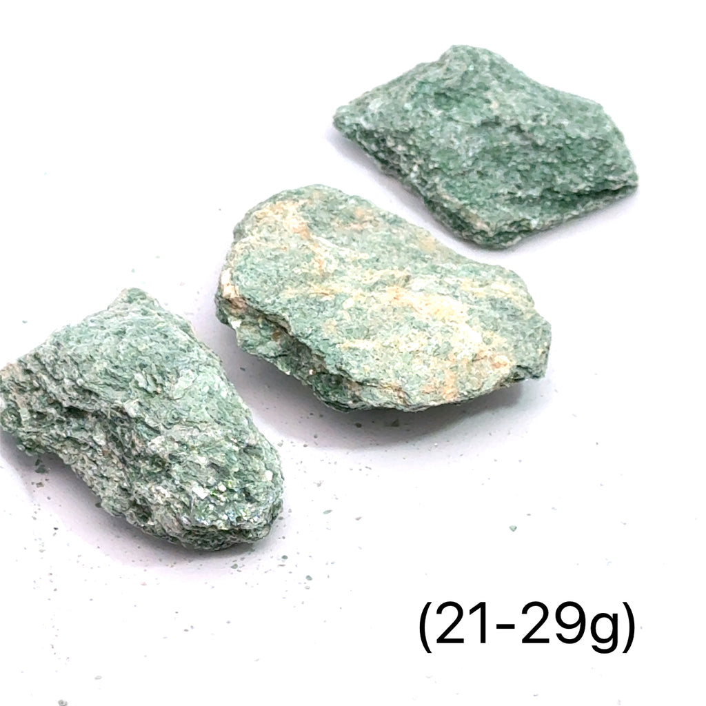 Raw Fuchsite Gemstone grouping on white 21-29g overview 