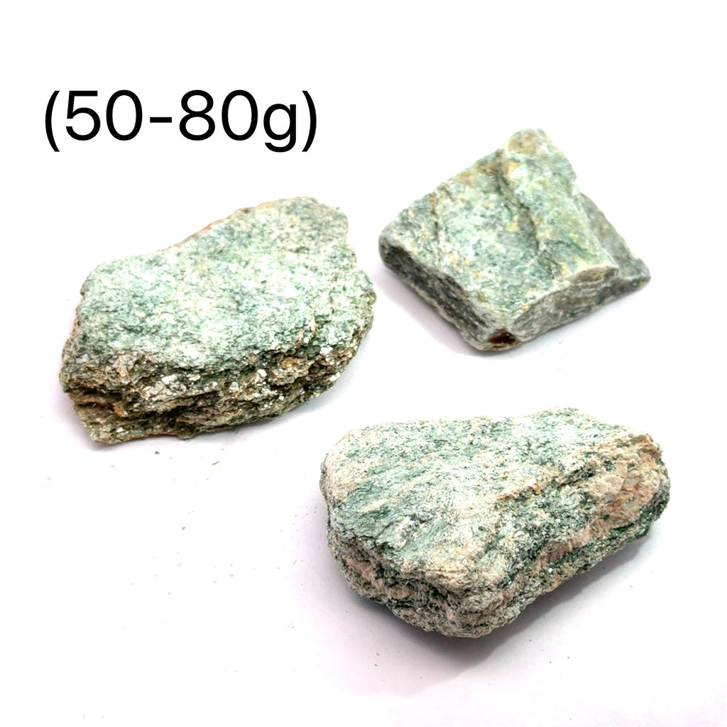 Raw Fuchsite Gemstone grouping on white 50-80g overview 