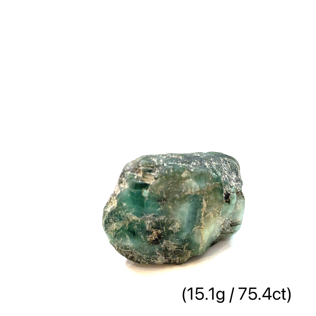Raw Grade‑A Emerald Gemstone on white 15.1g/75.4ct  overview